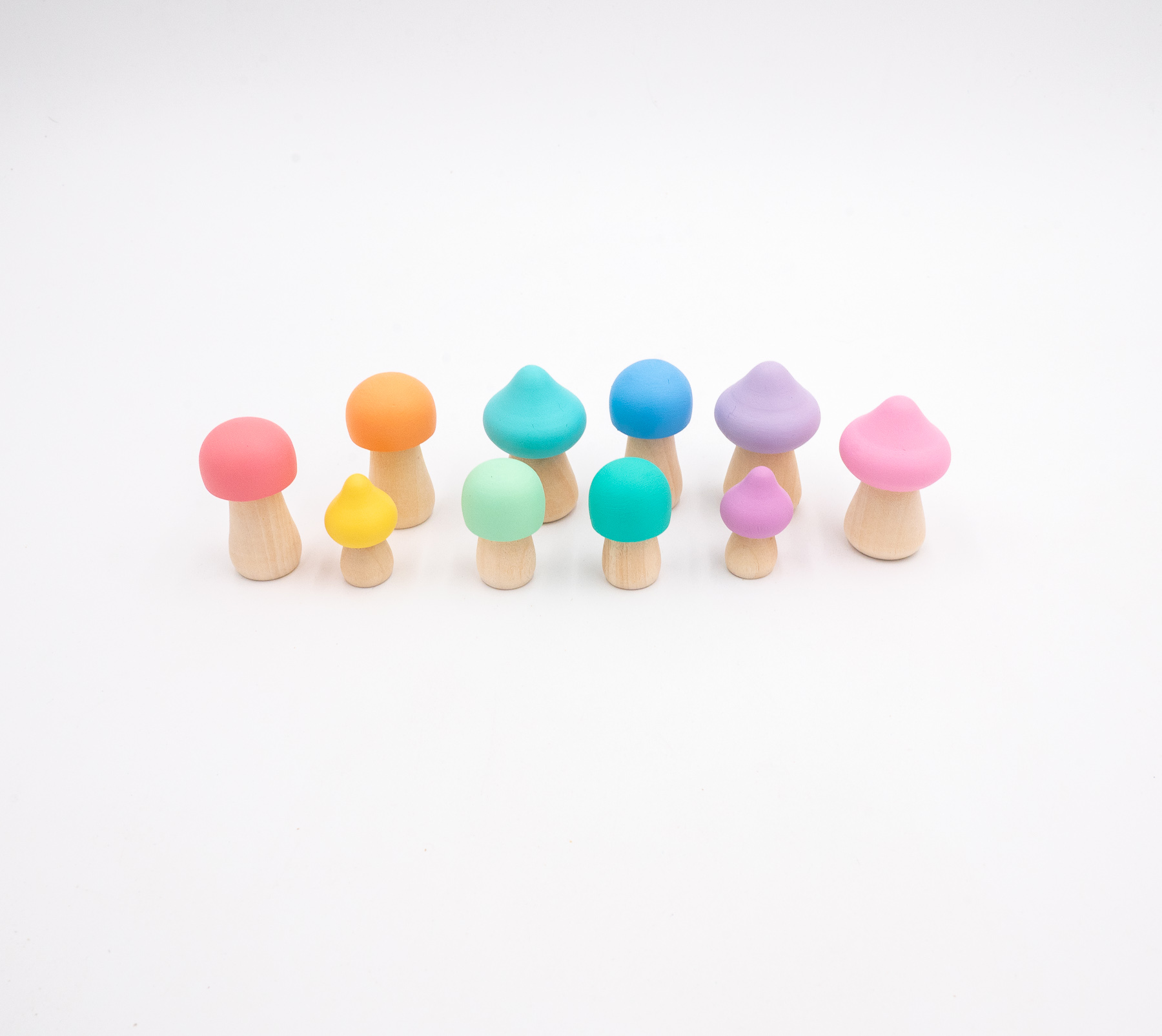 Assorted Pastel Rainbow Mushrooms Set of 10-2 Assorted Pastel Wooden Mushrooms set of 10 hand-painted mushrooms in soft rainbow colors and mixed shapes for sensory and small-world play