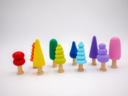 Assorted Rainbow Wooden Trees set of 10 hand-painted small wooden trees in bright colors and mixed shapes for sensory and small-world play