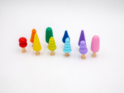 Assorted Rainbow Wooden Trees set of 10 hand-painted small wooden trees in bright colors and mixed shapes for sensory and small-world play