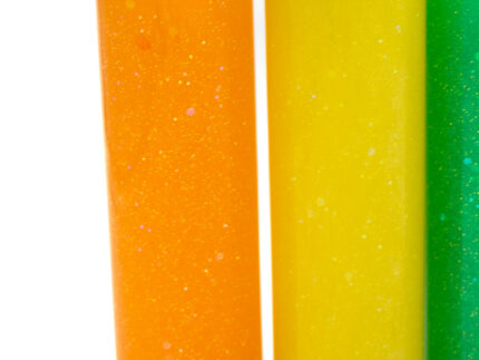Six glitter calming bottles in pink, orange, yellow, green, blue, and purple with sparkly glitter