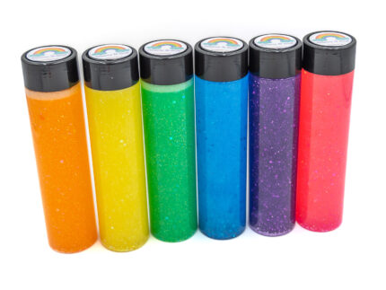 Six glitter calming bottles in pink, orange, yellow, green, blue, and purple with sparkly glitter