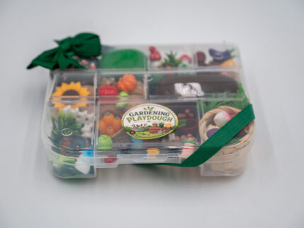 Deluxe Gardening Play-Doh Kit with colorful dough and miniature vegetables, flowers, plants, garden accessories, basket, and nature-themed pieces