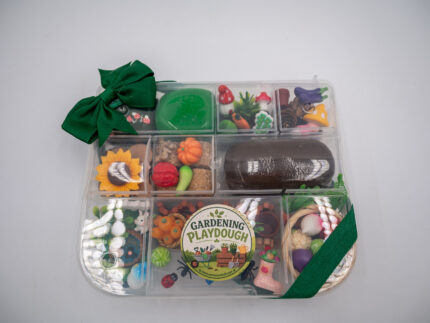 Deluxe Gardening Play-Doh Kit with colorful dough and miniature vegetables, flowers, plants, garden accessories, basket, and nature-themed pieces