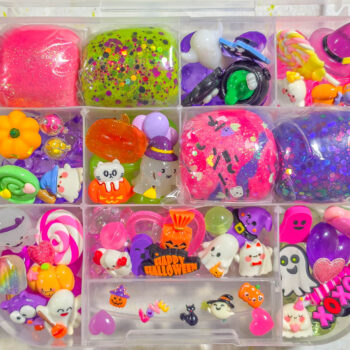 Deluxe Ghouly Pop Playdough Kit with pink, green, and purple playdough and cute ghost and candy charms in a clear case