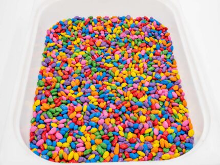 Rainbow Beans Sensory Filler with red, orange, yellow, green, blue, pink, and natural pinto beans for colorful sensory play