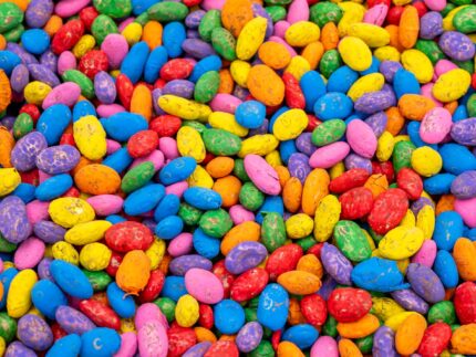 Rainbow Beans Sensory Filler with red, orange, yellow, green, blue, pink, and natural pinto beans for colorful sensory play